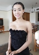 22 year old Thai shemale teases tourist on camera in her black dress